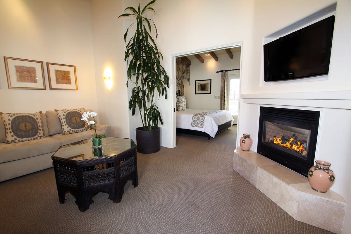 221-king-suite-with-veranda-living-room - Cypress Inn.
