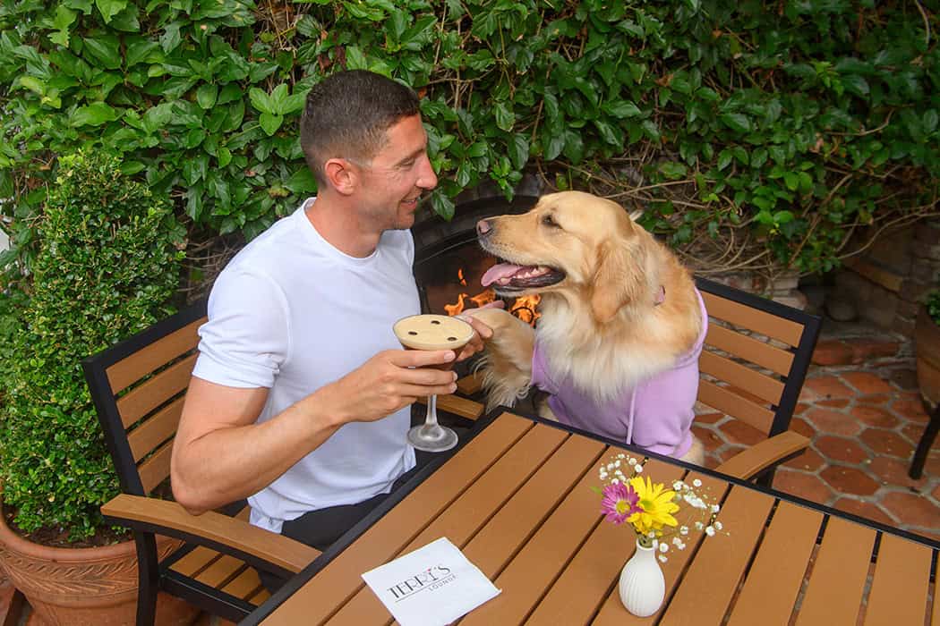 Hans and Lulu the dog Enjoy the Outdoor Patio at Terry's Lounge