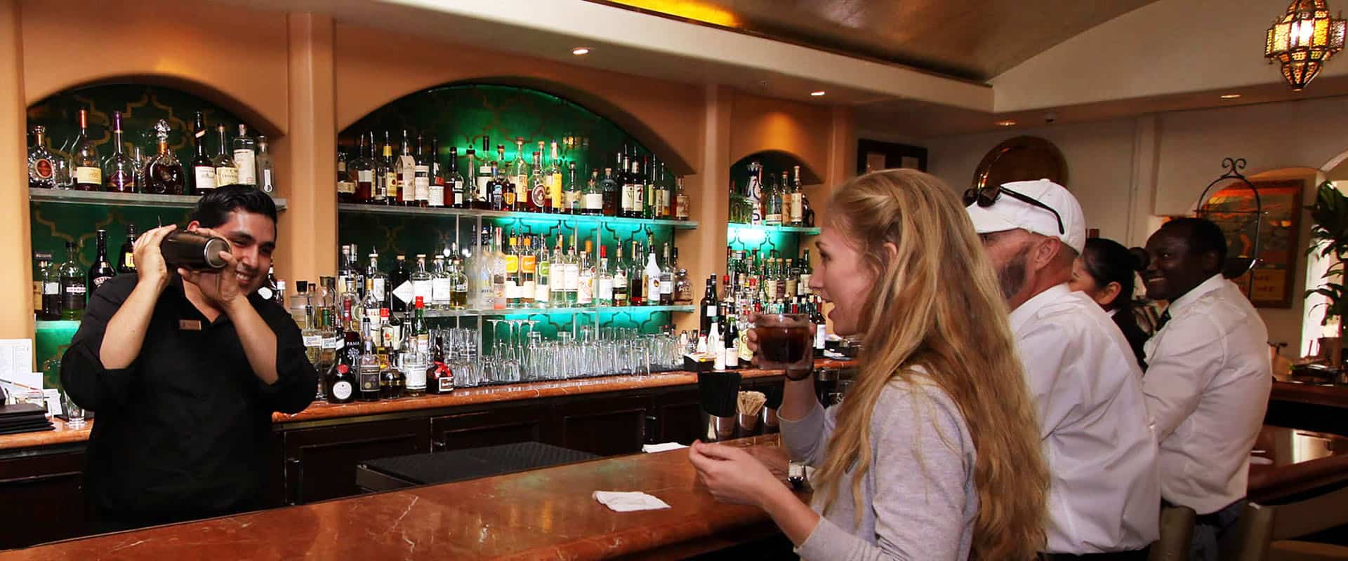 Guests Enjoying Cocktails at Terry's Lounge